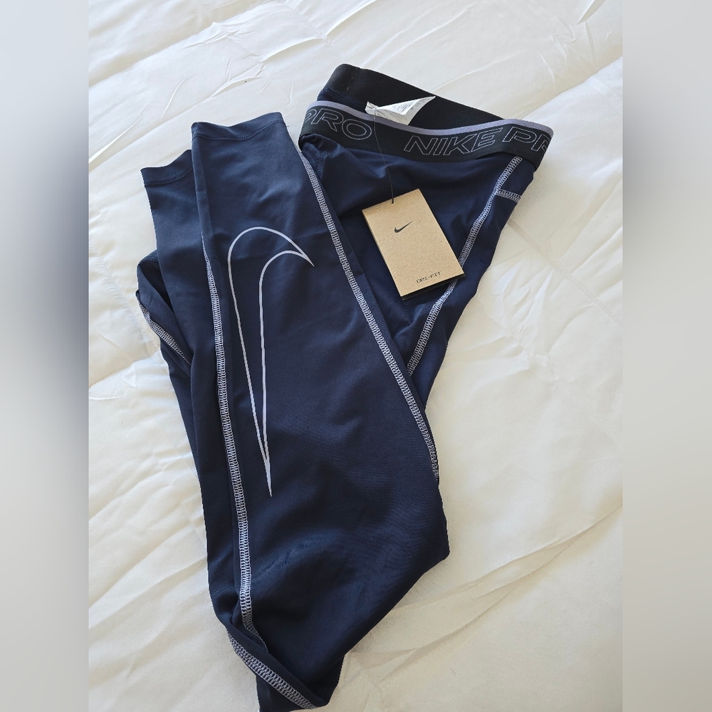 Nike Pro Dri-FIT men's  tights in obsidian or navy blue. 